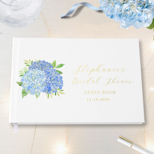 Blue hydrangea bridal shower guest book with modern watercolor blue hydrangea bouquet with foliage and gold foil script typography.