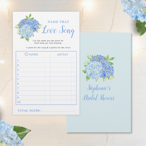 Blue hydrangea bridal shower love song game with modern watercolor blue hydrangea bouquet with foliage and script typography.