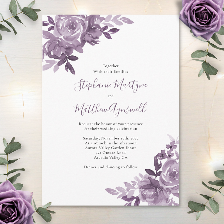 Wedding invitation with watercolor dusty mauve roses and script typography on a white background.