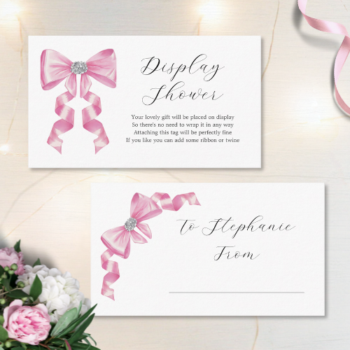 Shes tying the knot bridal shower coquette themed display shower card featuring a chic glam silky pink bow with sparkling rhinestones design and customizable modern script typography.