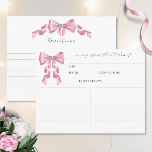 Shes tying the knot bridal shower coquette themed recipe card featuring a chic glam silky pink bow with sparkling rhinestones design and modern script typography.