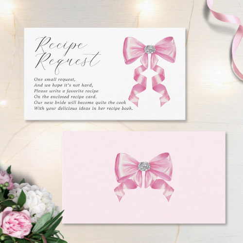 Shes tying the knot bridal shower coquette themed recipe request card featuring a chic glam silky pink bow with sparkling rhinestones design and modern script typography with pink background and bow on the reverse side.