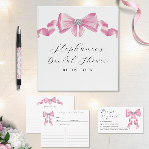 Shes tying the knot bridal shower coquette themed bridal shower recipe binder, recipe request card, recipe card and pen featuring a chic glam silky pink bow with sparkling rhinestones design and customizable modern script typography.