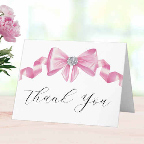 Shes tying the knot bridal shower coquette themed thank you card featuring a chic glam silky pink bow with sparkling rhinestones design and modern script typography.