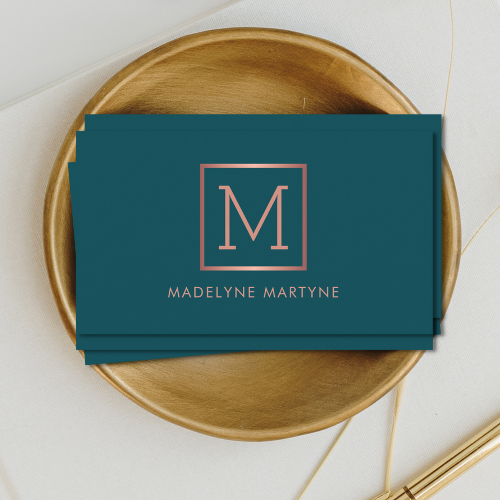 Elegant classy minimalist teal business cards with rose gold style monogram logo in clean modern typography font.